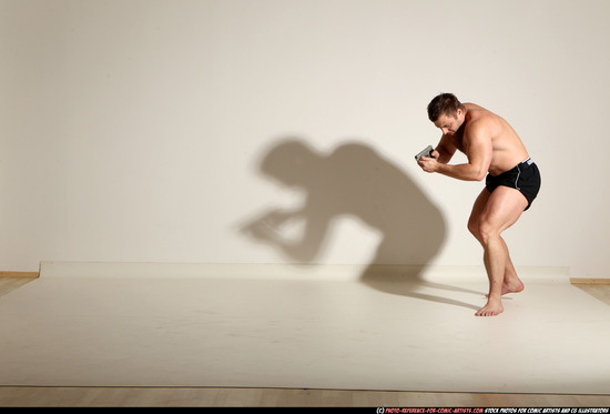 Man Adult Muscular White Fighting with gun Moving poses Underwear