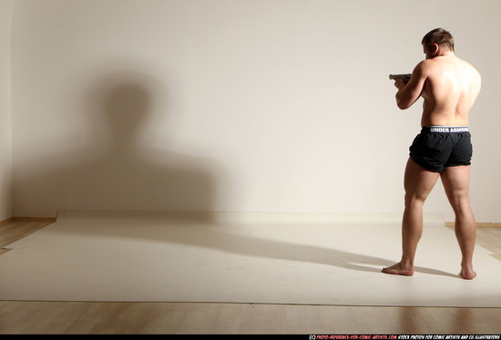 Man Adult Muscular White Fighting with gun Moving poses Underwear