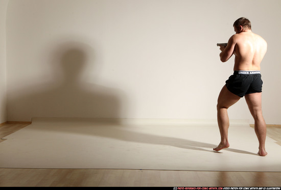 Man Adult Muscular White Fighting with gun Moving poses Underwear