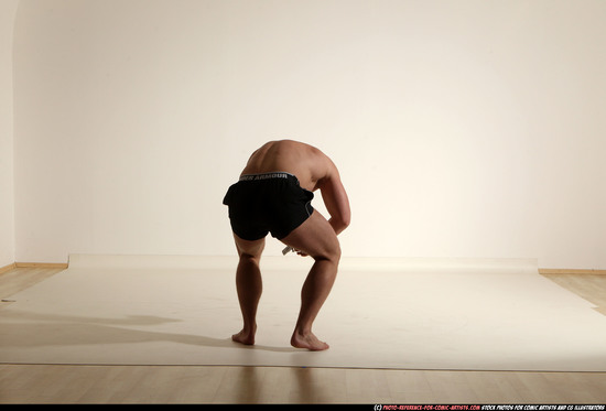 Man Adult Muscular White Fighting with gun Moving poses Underwear