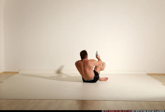 Man Adult Muscular White Fighting with gun Moving poses Underwear