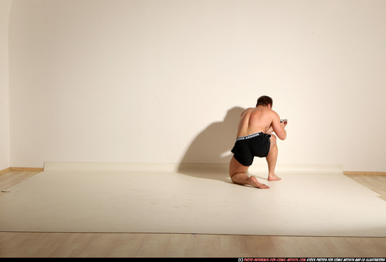 Man Adult Muscular White Fighting with gun Moving poses Underwear