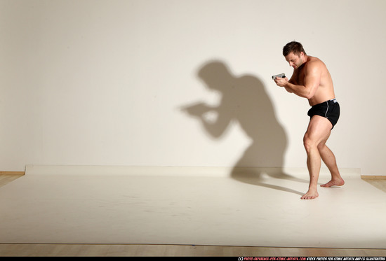 Man Adult Muscular White Fighting with gun Moving poses Underwear