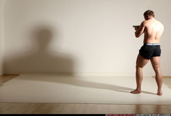 Man Adult Muscular White Fighting with gun Moving poses Underwear