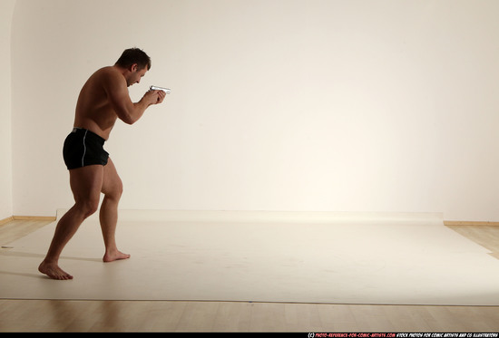 Man Adult Muscular White Fighting with gun Moving poses Underwear