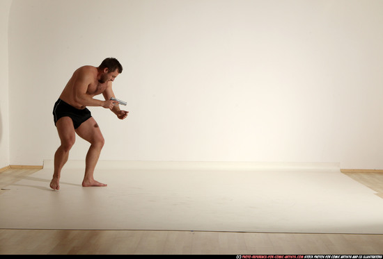 Man Adult Muscular White Fighting with gun Moving poses Underwear