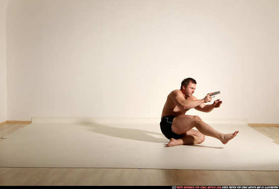 Man Adult Muscular White Fighting with gun Moving poses Underwear