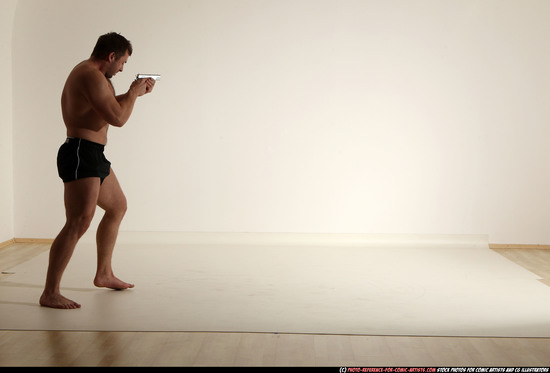 Man Adult Muscular White Fighting with gun Moving poses Underwear