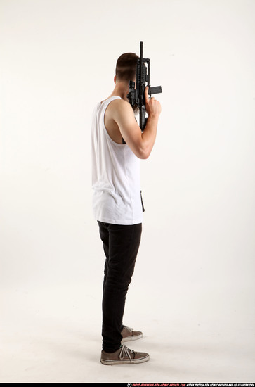 Man Adult Athletic White Fighting with gun Standing poses Casual