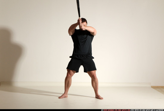 Man Adult Muscular White Moving poses Sportswear Fighting with bat