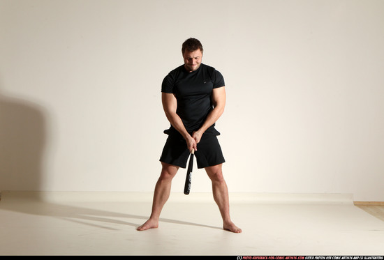 Man Adult Muscular White Moving poses Sportswear Fighting with bat