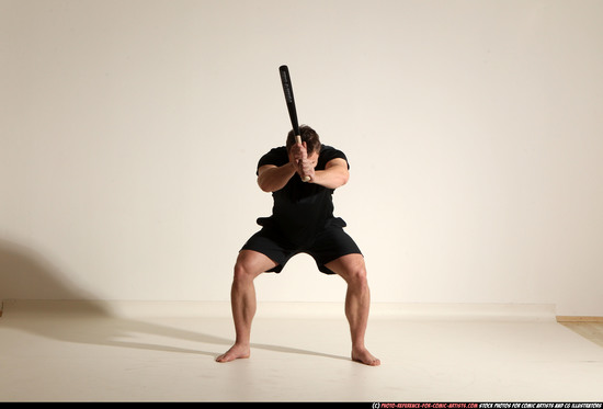 Man Adult Muscular White Moving poses Sportswear Fighting with bat