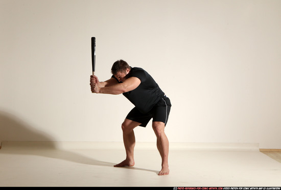 Man Adult Muscular White Moving poses Sportswear Fighting with bat