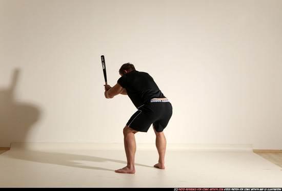 Man Adult Muscular White Moving poses Sportswear Fighting with bat