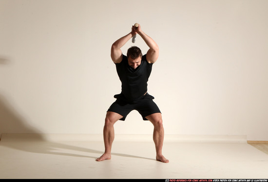 Man Adult Muscular White Moving poses Sportswear Fighting with bat