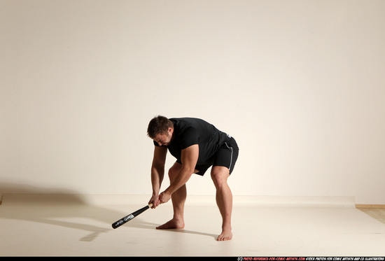 Man Adult Muscular White Moving poses Sportswear Fighting with bat