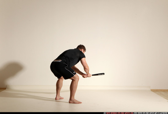 Man Adult Muscular White Moving poses Sportswear Fighting with bat