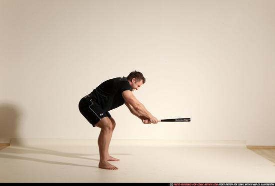 Man Adult Muscular White Moving poses Sportswear Fighting with bat