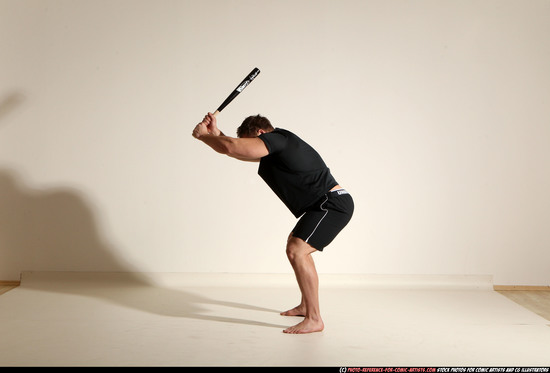 Man Adult Muscular White Moving poses Sportswear Fighting with bat