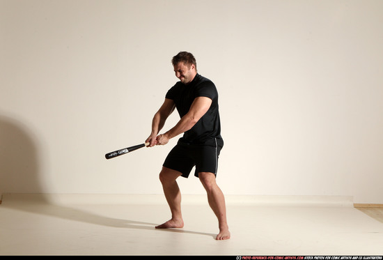 Man Adult Muscular White Moving poses Sportswear Fighting with bat