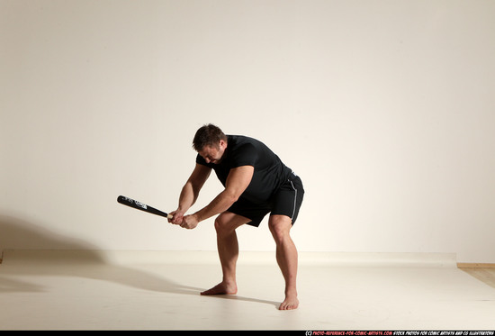Man Adult Muscular White Moving poses Sportswear Fighting with bat