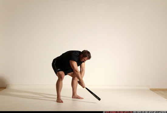 Man Adult Muscular White Moving poses Sportswear Fighting with bat