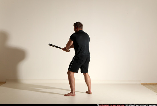 Man Adult Muscular White Moving poses Sportswear Fighting with bat