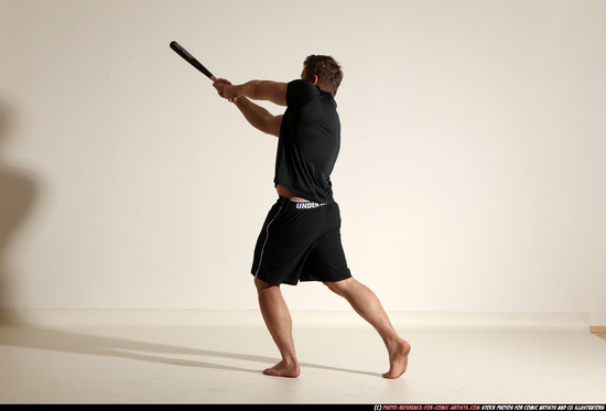 Adult Muscular White Moving poses Sportswear Fighting with bat