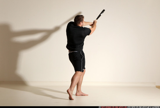 Adult Muscular White Moving poses Sportswear Fighting with bat