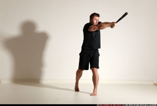 Adult Muscular White Moving poses Sportswear Fighting with bat