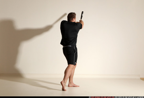 Adult Muscular White Moving poses Sportswear Fighting with bat