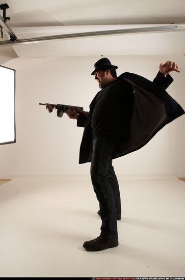 Man Old Average White Fighting with gun Standing poses Coat