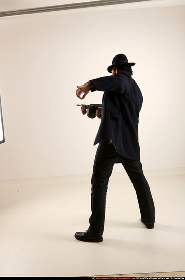 Man Old Average White Fighting with gun Standing poses Coat