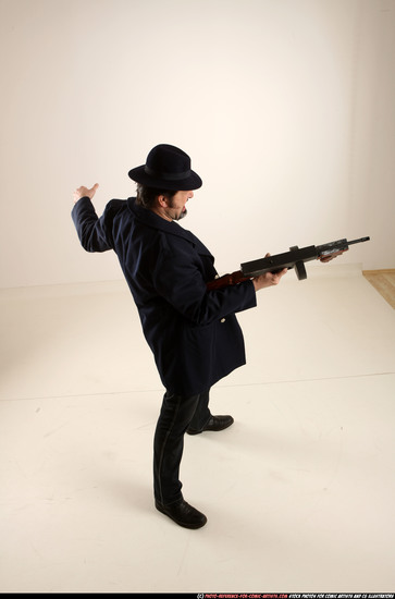 Man Old Average White Fighting with gun Standing poses Coat