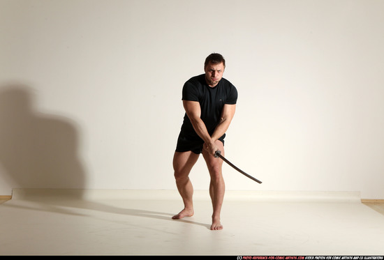 Man Adult Muscular White Fighting with sword Moving poses Sportswear