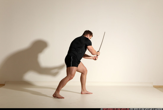 Man Adult Muscular White Fighting with sword Moving poses Sportswear