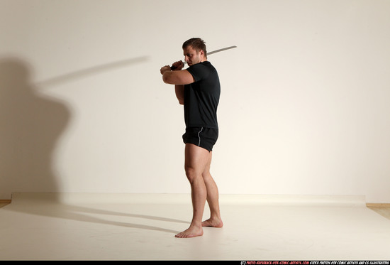 Man Adult Muscular White Fighting with sword Moving poses Sportswear