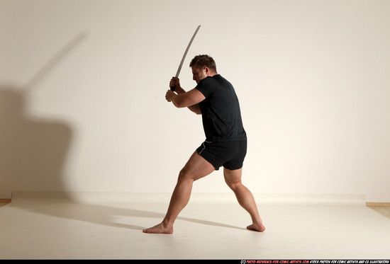 Man Adult Muscular White Fighting with sword Moving poses Sportswear