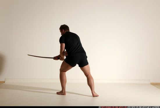 Man Adult Muscular White Fighting with sword Moving poses Sportswear