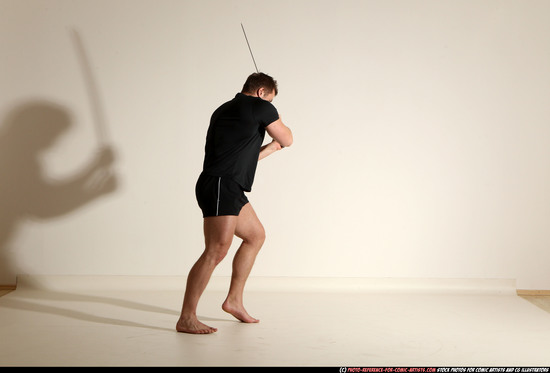 Man Adult Muscular White Fighting with sword Moving poses Sportswear