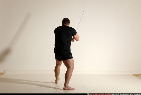 Man Adult Muscular White Fighting with sword Moving poses Sportswear