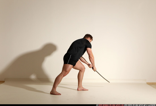 Man Adult Muscular White Fighting with sword Moving poses Sportswear