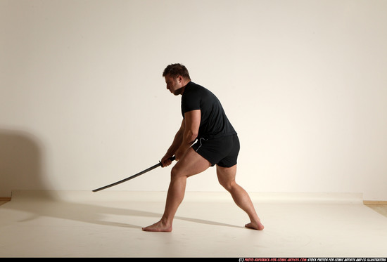 Man Adult Muscular White Fighting with sword Moving poses Sportswear