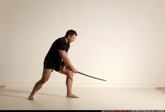 Man Adult Muscular White Fighting with sword Moving poses Sportswear