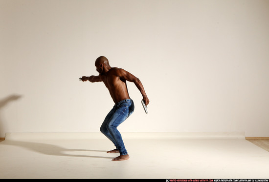 Man Adult Athletic Black Fighting with gun Moving poses Pants