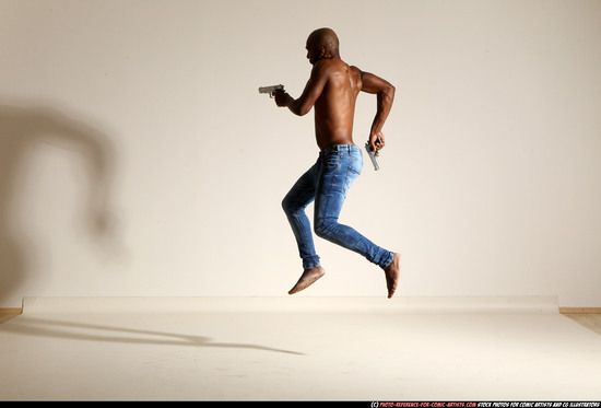 Man Adult Athletic Black Fighting with gun Moving poses Pants