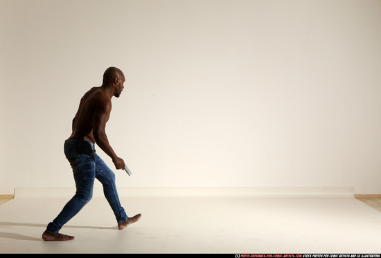 Man Adult Athletic Black Fighting with gun Moving poses Pants