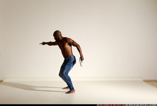 Man Adult Athletic Black Fighting with gun Moving poses Pants