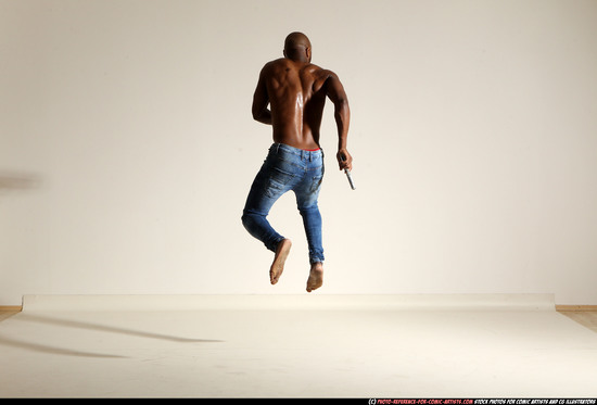 Man Adult Athletic Black Fighting with gun Moving poses Pants