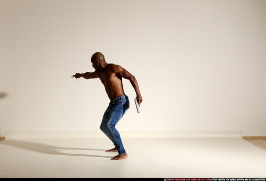 Man Adult Athletic Black Fighting with gun Moving poses Pants